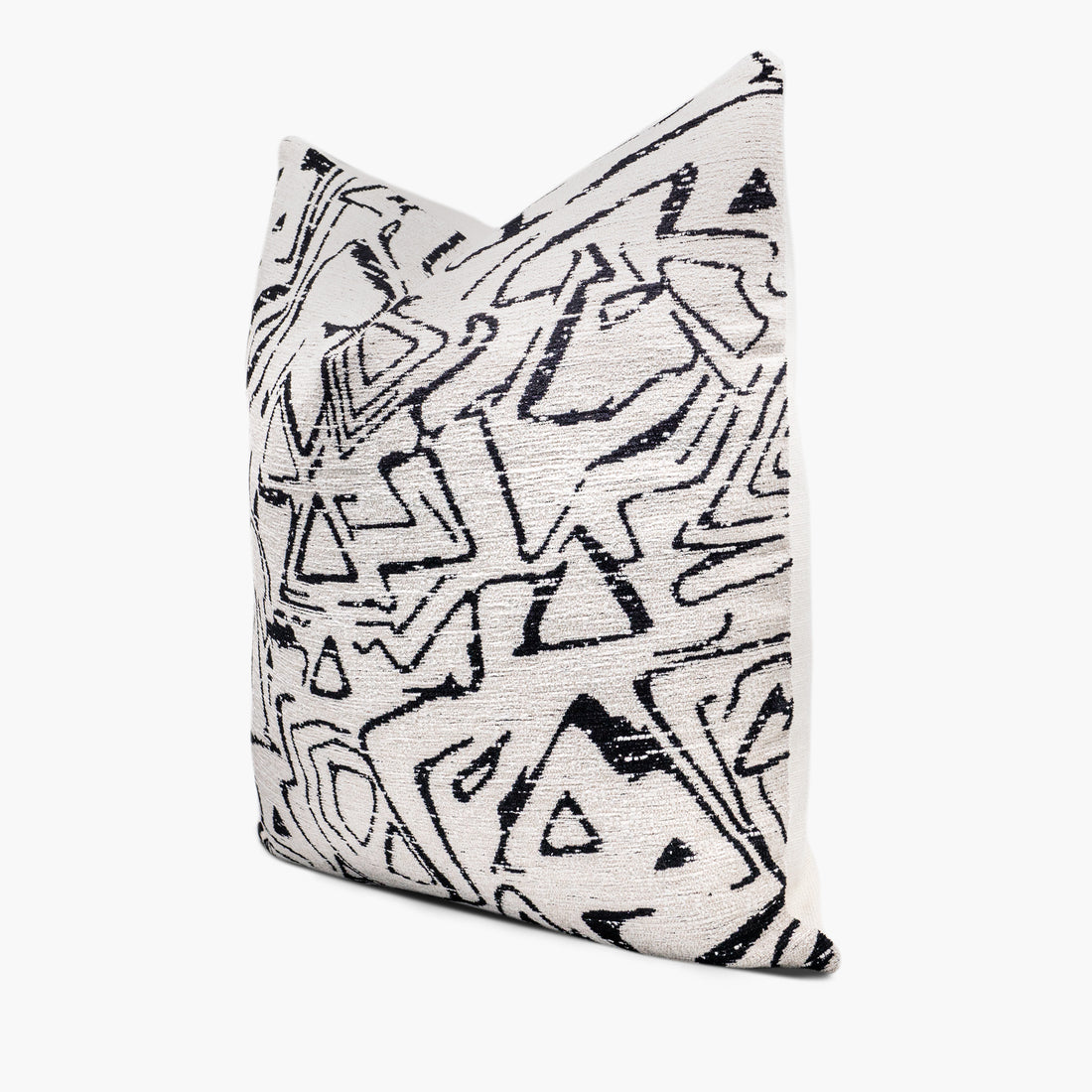 Side view of modern geometric throw pillow cushion in black and white featuring Kravet 34955 fabric