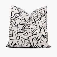 Modern geometric throw pillow cushion in black and white featuring Kravet 34955 fabric