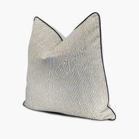 Quarter view of a modern striped throw pillow with Kelly Wearstler Avant fabric