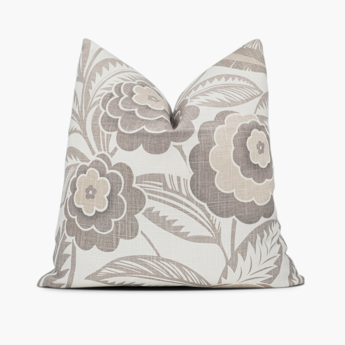 Floral throw pillow with large flowers in beige, tan, and cream