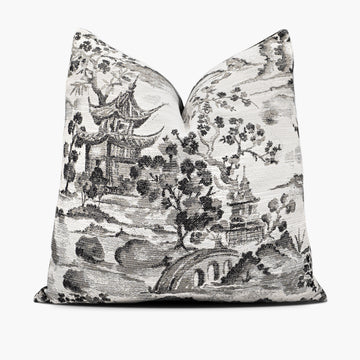 Decorative throw pillow with a black and white chinoiserie pattern