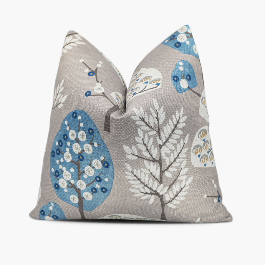 Mid-century modern throw pillow with a blue and gray tree motif