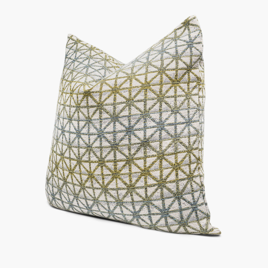 Side view of blue and green outdoor pillow featuring Justina Blakeney Aruba Lattice fabric