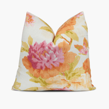 Floral throw pillow in white orange and pink