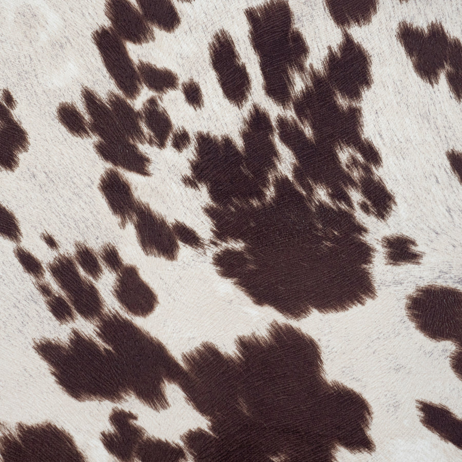 Faux suede cowhide fabric in brown and white