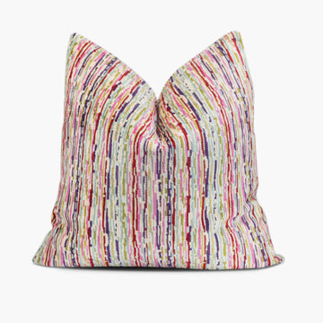 Velvet throw pillow with thin stripes in candy colors