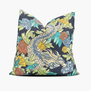 Chinoiserie throw pillow with a dragon motif in blue, red, and yellow