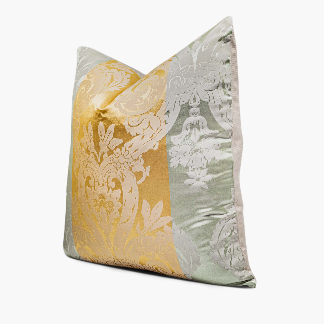 A silk-blend throw pillow sits against a white background. The pillow features a damask motif set against three vertical stripes. The middle stripe is gold and the outer stripes are pale green. The pillow is shown from the side.