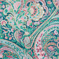 Macro shot of cotton paisley fabric in teal and pink