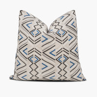 Geometric tribal throw pillow cushion in beige, blue, and charcoal gray