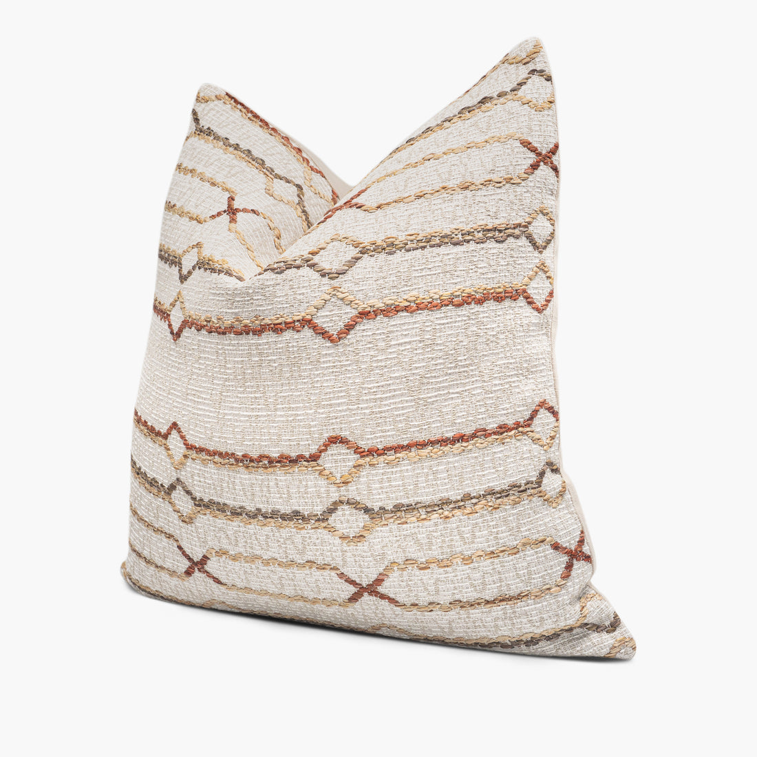 Side view of geometric throw pillow cushion with woven Macrame Hemp fabric in earth tones