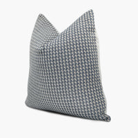 Side view of houndstooth throw pillow in navy blue and white