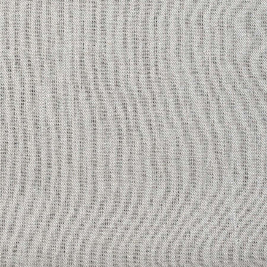 A close-up of a light, stone gray linen fabric.