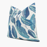 Side view of blue and teal throw pillow cushion with Justina Blakeney Maldives Leaves fabric