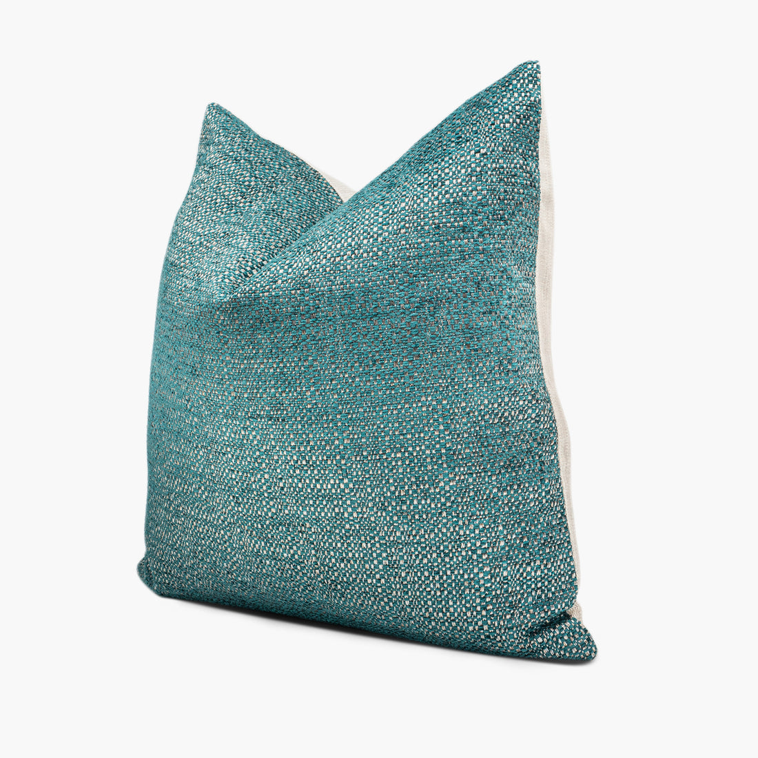 Side view of metallic throw pillow in teal, silver, and gold