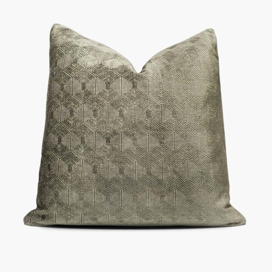 Moss green velvet throw pillow with a geometric hexa-diamond motif