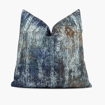 Chenille throw pillow cushion with an ocean blue and bronze abstract motif