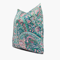 Side view of maximalist paisley throw pillow cushion in teal, pink, and duck egg blue