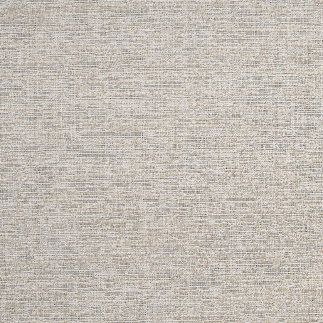 A close-up of a pale gold fabric with a woven texture