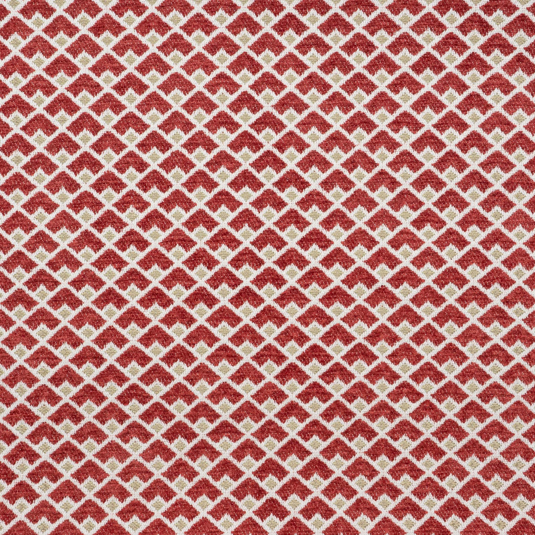 A close-up of Robert Allen Masala geometric fabric in ruby red and gold.