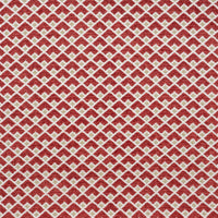 A close-up of Robert Allen Masala geometric fabric in ruby red and gold.