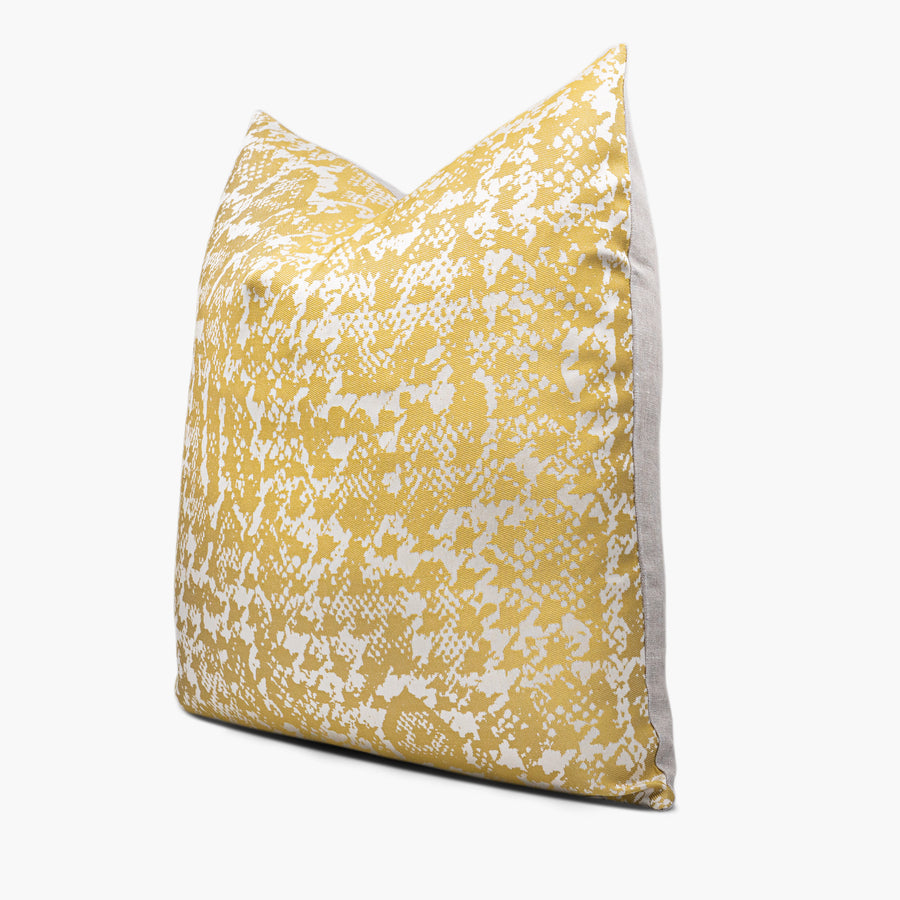 Side view of citrine yellow gold throw pillow cushion with an abstract snakeskin motif