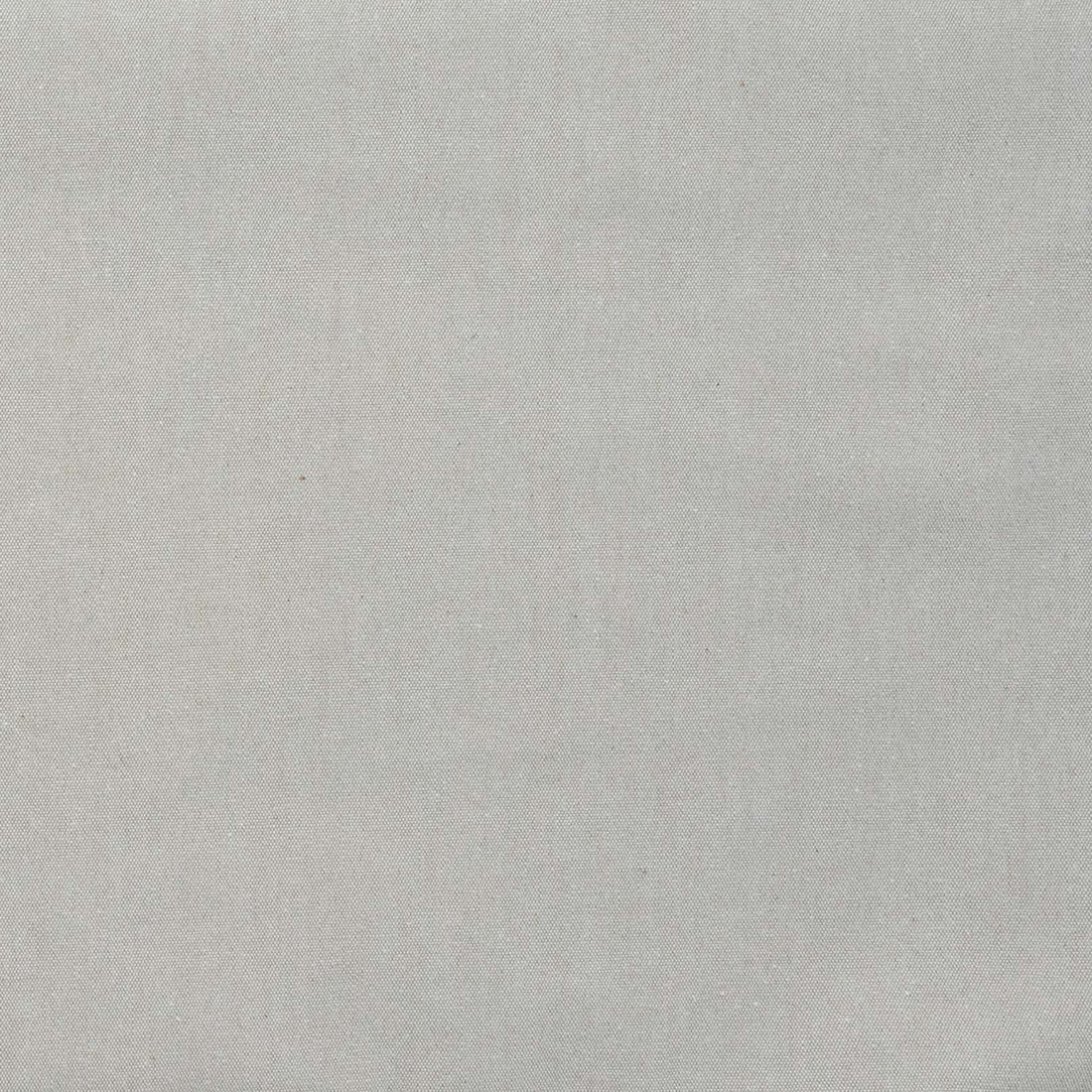 A close-up of stone gray cotton fabric.