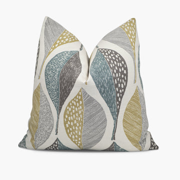 Teal green and gray throw pillow with a large leaf pattern