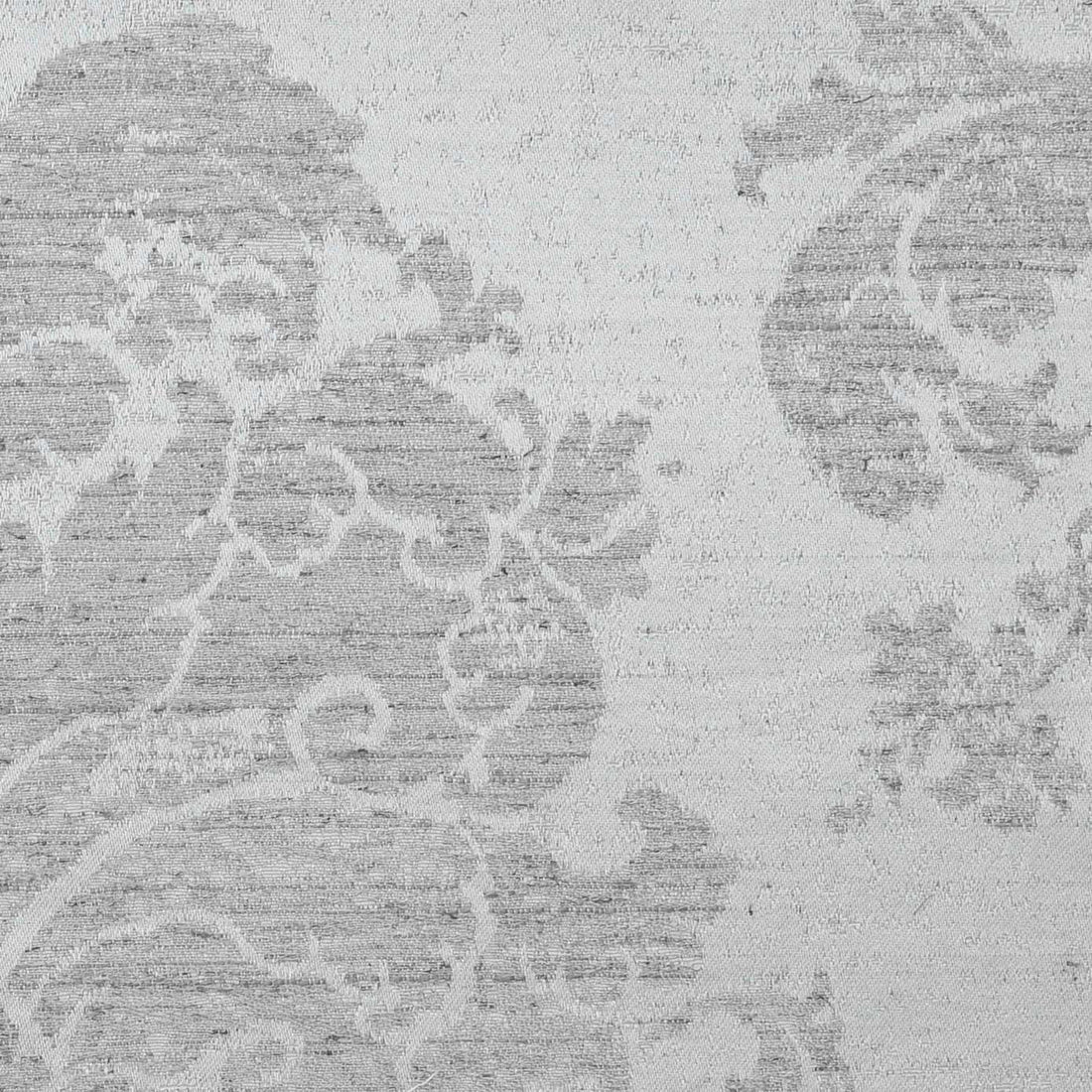 A close-up of Venezia Damask Silver Gray fabric.